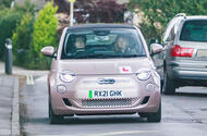 Learner driver in Fiat 500e front tracking Learner driver in Fiat 500e front tracking