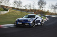 Porsche 911 GT3 at Nurburgring cornering front Porsche 911 GT3 at Nurburgring cornering front