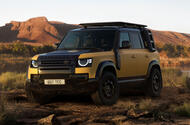 Land Rover Defender Trophy Edition front quarter yellow Land Rover Defender Trophy Edition front quarter yellow