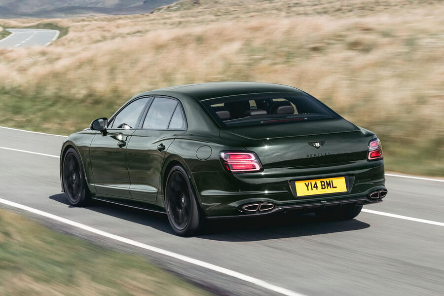 Facelifted 2026 Bentley Flying Spur driving on the road – rear