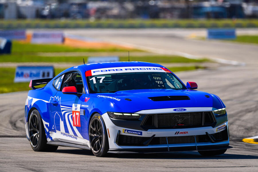 Jim Farley racing a Ford Mustang