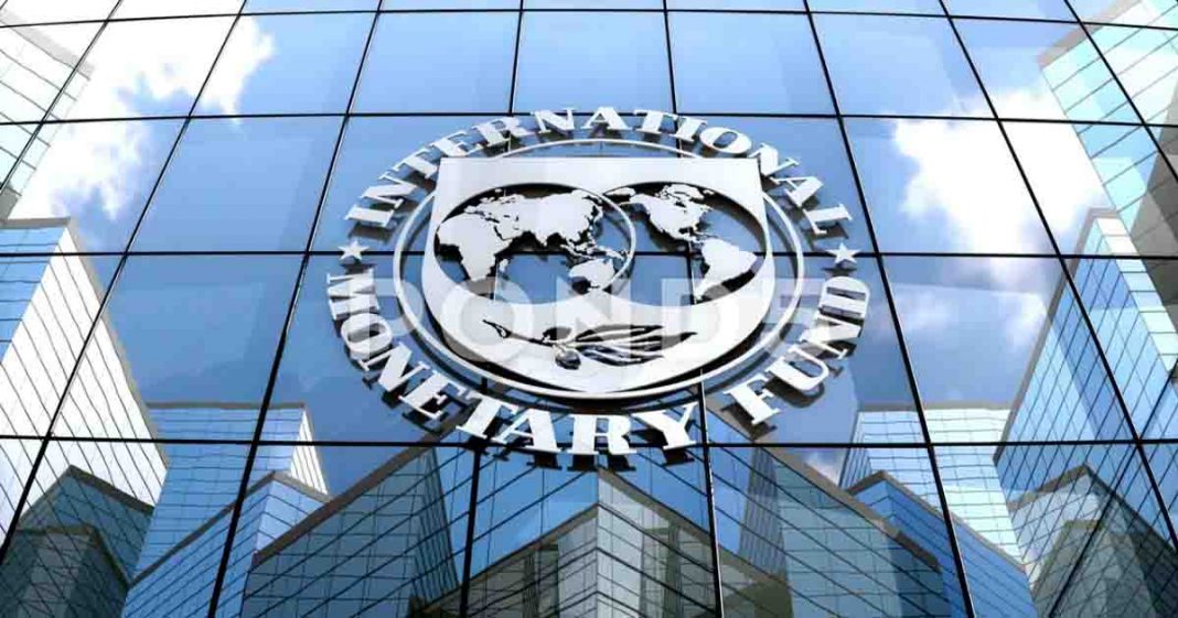 Shows IMF logo on a glass building