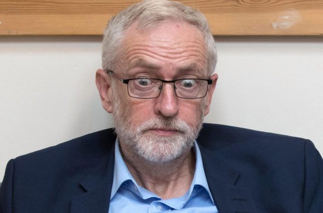 UK Tory MP apologises to Labour's Corbyn over spy claim apologises