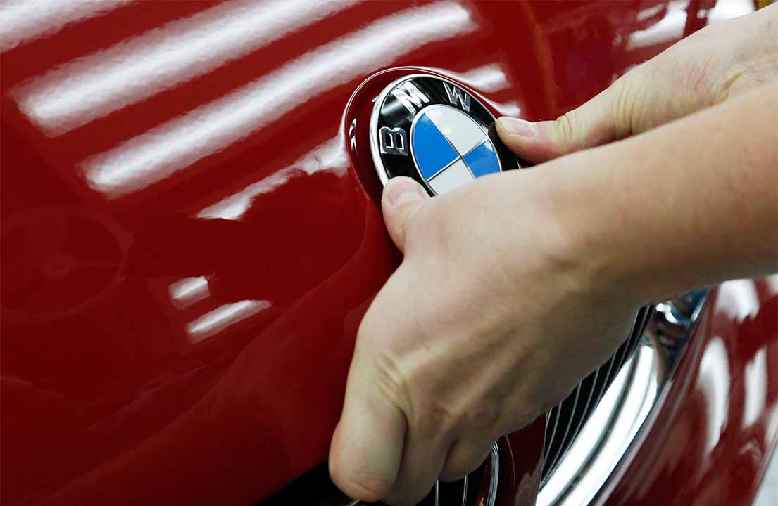 BMW names new boss to steer car giant in tough times