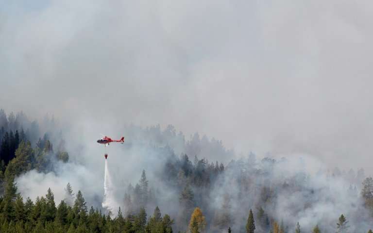 Heavy smoke from wildfires blankets the US Midwest and Northeast, prompting evacuations