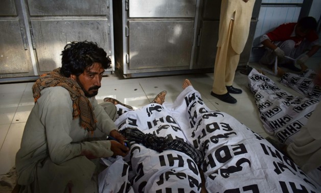 suicide-blast-rips-through-pakistan-election-rally-killing-128