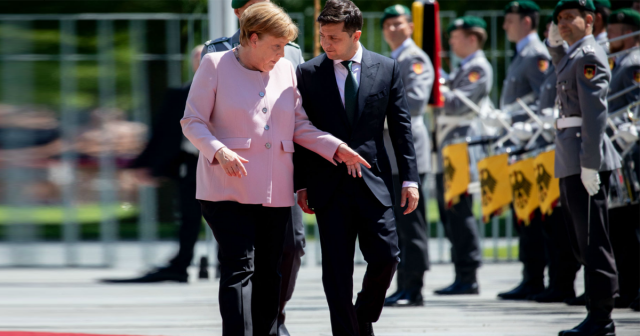 Merkel says she's 'fine' after trembling from dehydration Merkel