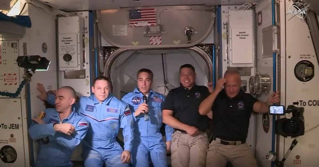 astronauts enter space station