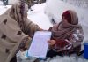 Polio worker snowfall