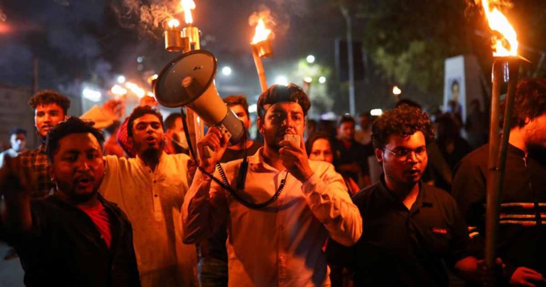 A train set on fire by protesters in Bangladesh