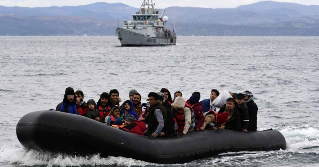 Greece handcuffed migrants