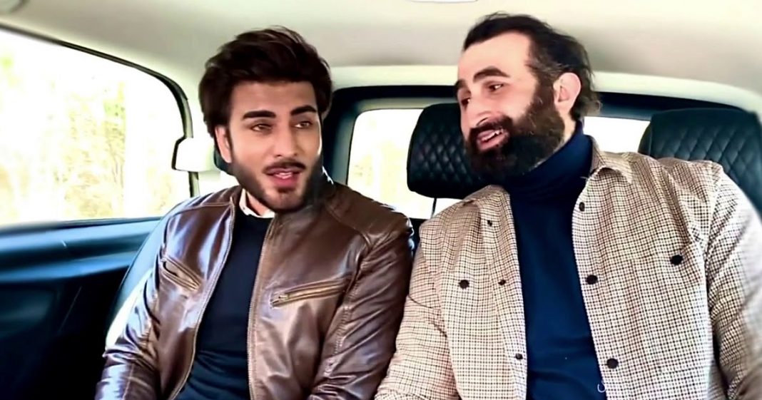 Imran Abbas sitting in car with ertugrul actor