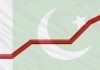 Graph going up with Pakistan's flag in background