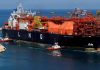 Pakistan LNG (Shows an LNG ship docked at a port with orange container on top)