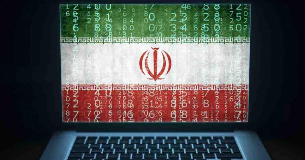 shows a laptop with Iranian Flag and a cyber attack happening