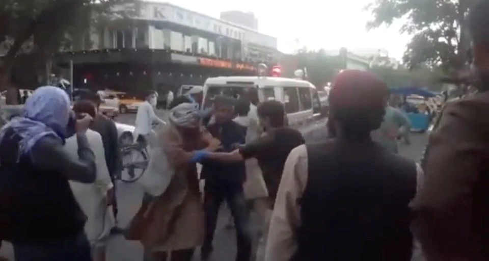 Injured people arrive at a hospital in Kabul after blast