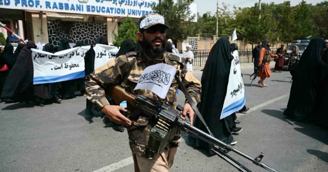 veiled Afghan women rally