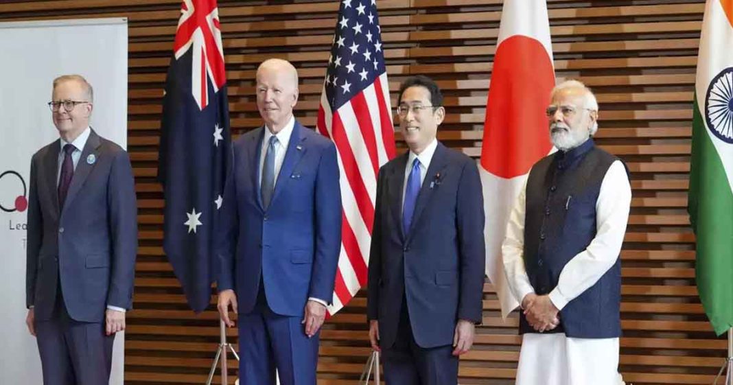 Quad opposes change by force