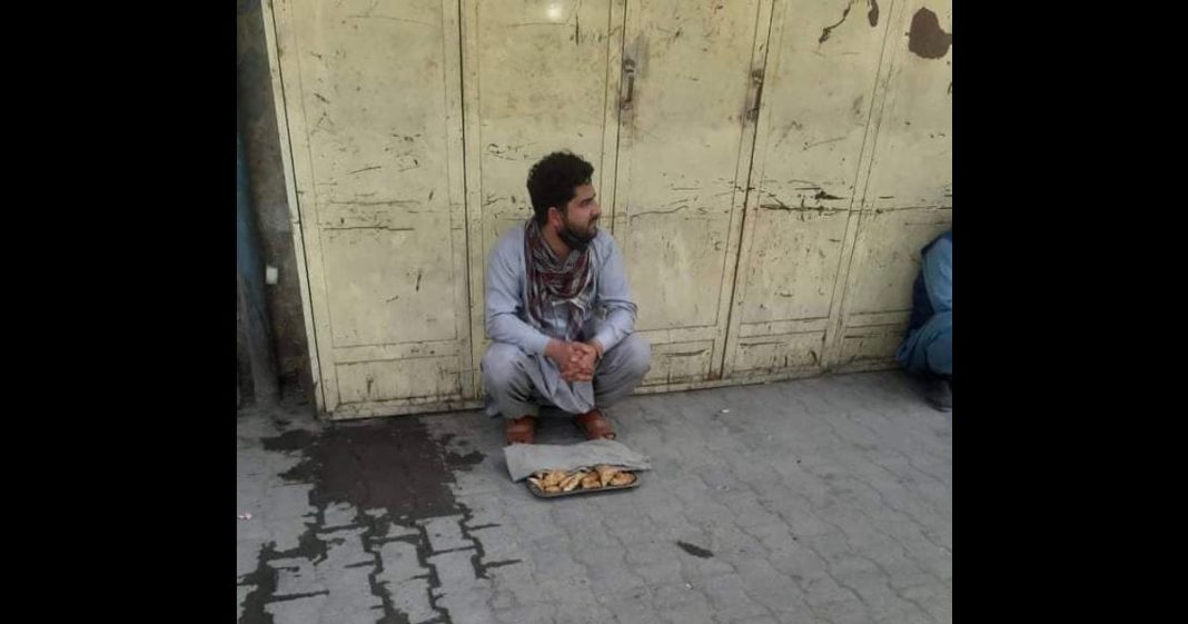 Afghan journalist sell food