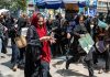 Taliban beat women protester