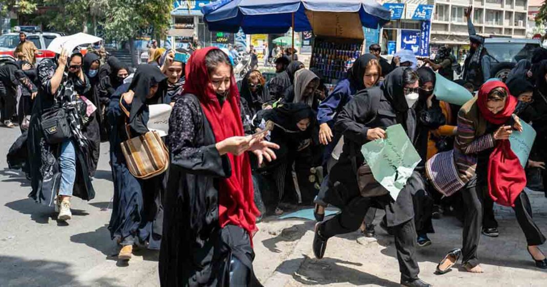 Taliban beat women protester