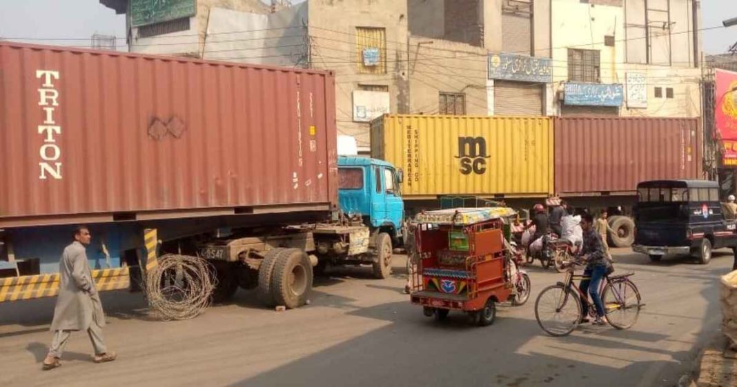 Routes leading to PTI rally blocked by containers