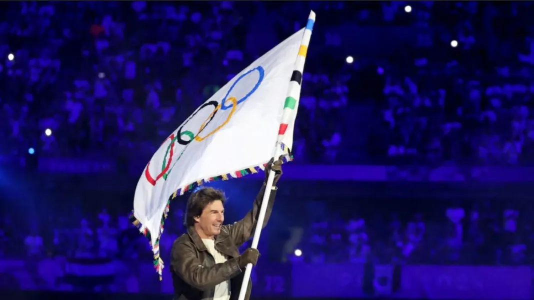 Tom Cruise hands Olympic flag to LA