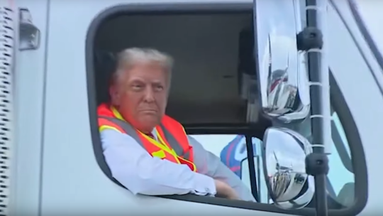 trump rides in garbage truck