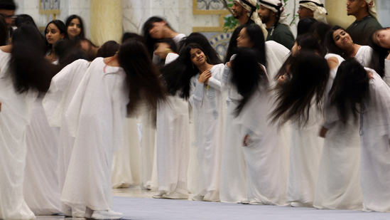 hair-flipping ritual performed by women