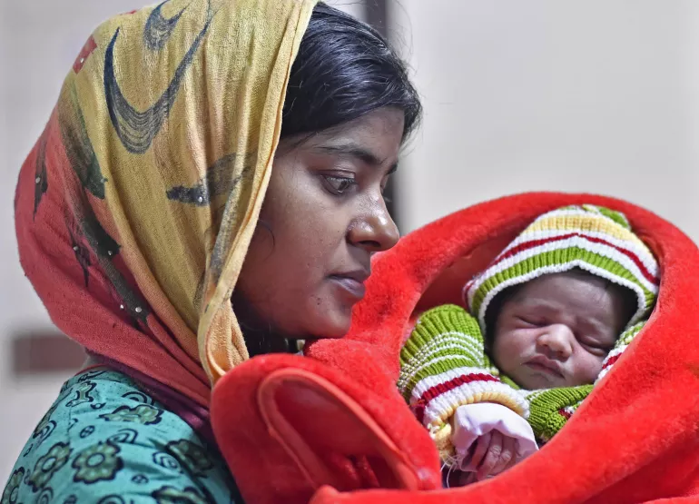 south asian mother and newborn