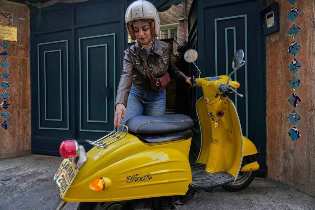 Women riding the streets of Tehran