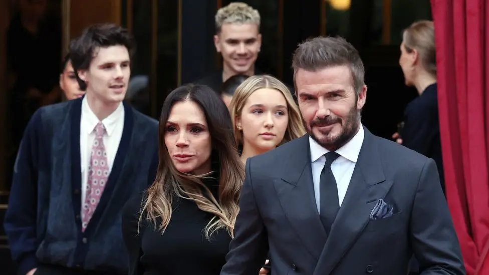 Victoria and David Beckham with their family