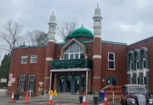 A man has been arrested after walking into a mosque
