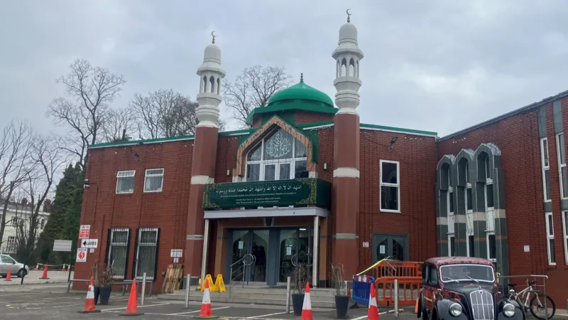 A man has been arrested after walking into a mosque