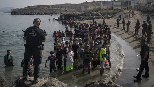 Spain migration invasion